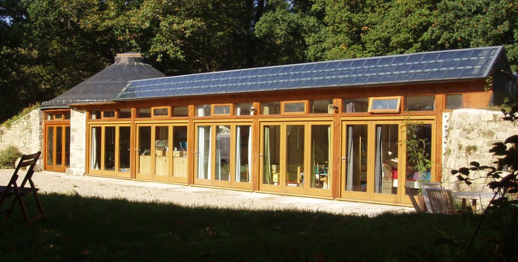 brittany groundhouse earthship with solar thermal slates